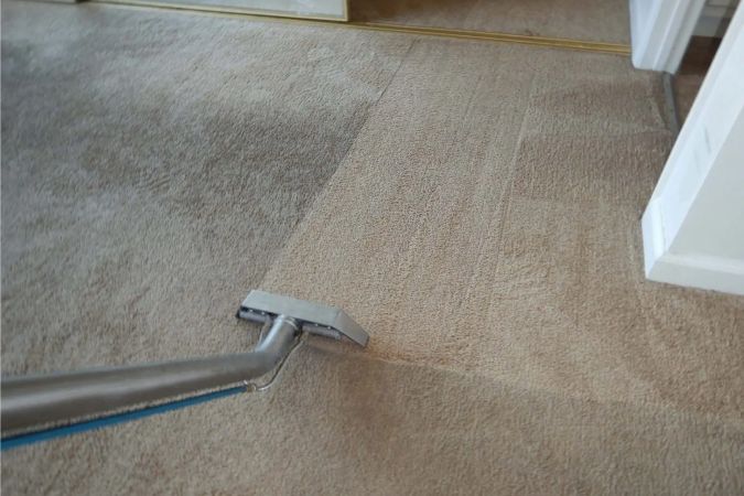 Residential carpet cleaning machine refreshing light-toned carpet in a Sydney home